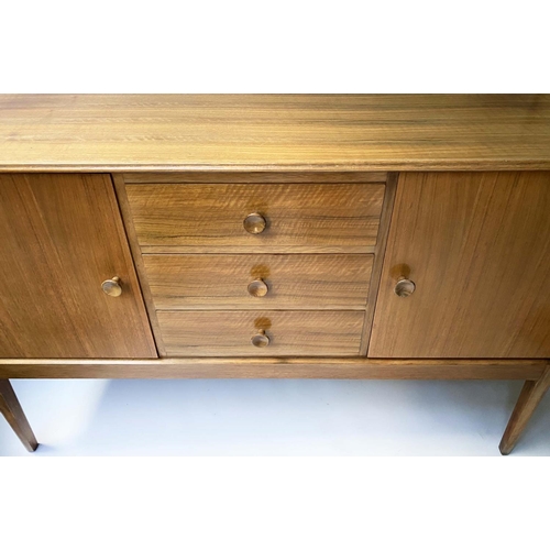 515 - GORDON RUSSELL SIDEBOARD, 1960's walnut with three drawers flanked by cupboards, stamped 'Gordon Rus... 