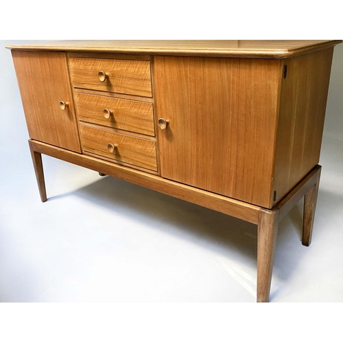 515 - GORDON RUSSELL SIDEBOARD, 1960's walnut with three drawers flanked by cupboards, stamped 'Gordon Rus... 