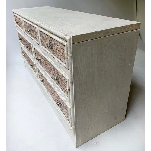 506 - FAUX BAMBOO LOW CHEST, 145cm x 46cm x 77cm H, with three short and four long cane panelled drawers.