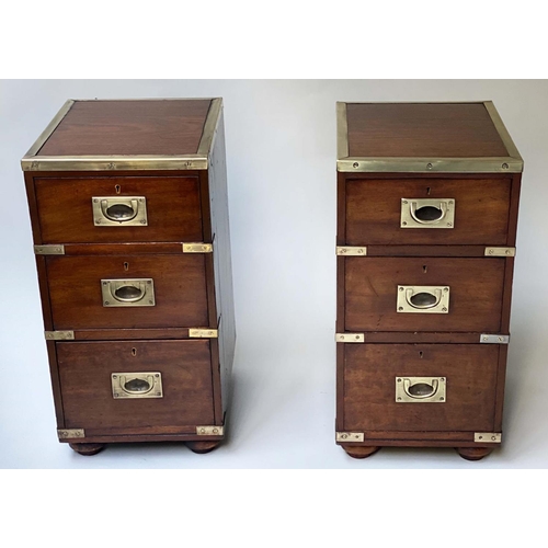 507 - CAMPAIGN BEDSIDE CHESTS, a pair, adapted late 19th century Naval mahogany and brass bound each with ... 