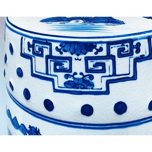 508 - BARREL STOOLS, a pair, Chinese export style ceramic blue and white, pierced with 'cloud' decoration,... 