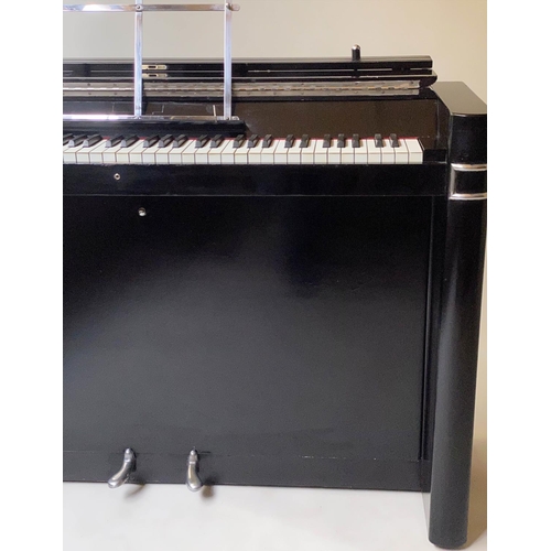 502 - EAVESTAFF MINI PIANO, Art Deco black lacquered and chrome mounted case, registration No. 12200, 130c... 