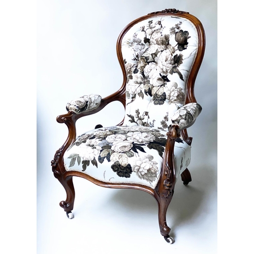 489 - ARMCHAIR, 19th century walnut, showframe carved, with buttoned autumnal rose white cotton upholstery... 