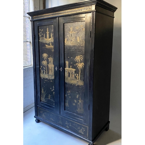 480 - CHINOISERIE WARDROBE, 19th century black lacquered and Chinoiserie panelled with two doors enclosing... 