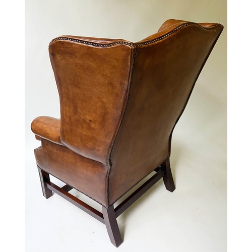 471 - WING ARMCHAIR, George III design, in studded natural hide, with stretchered supports, 80cm W.