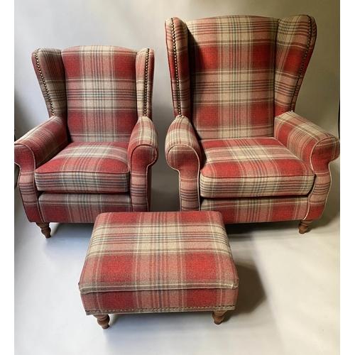 473 - WING ARMCHAIRS, a companion pair, studded woven tartan on turned feet with ottoman footstool, chairs... 