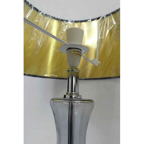 298 - COACH HOUSE TABLE LAMPS, a pair, 68cm H clear glass with shades. (2)