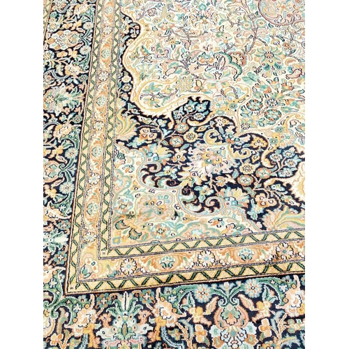 309 - FINE PURE SILK HEREKE DESIGN CARPET, 345cm x 250cm.