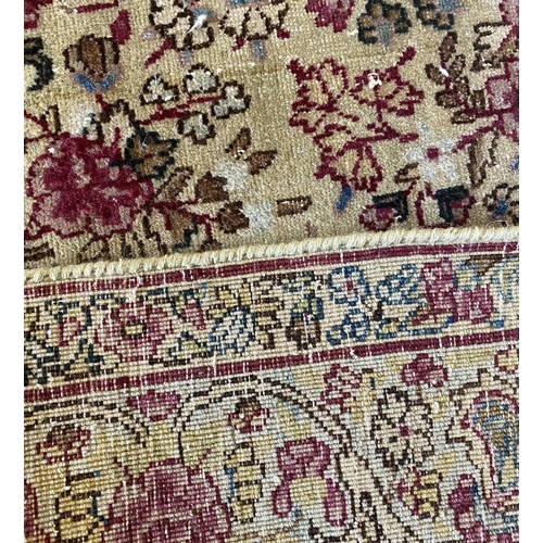 323 - ANTIQUE KERMAN LAVER RUG, 197cm x 128cm.