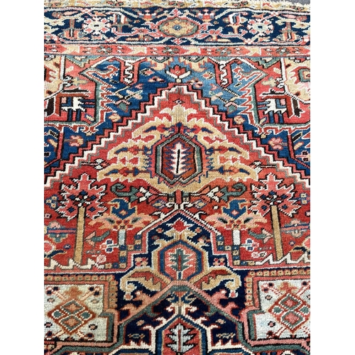 327 - ANTIQUE HERIZ SERAPI CARPET, 310cm x 235cm.