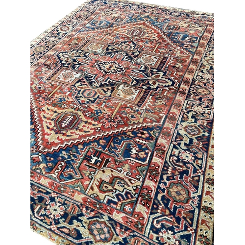 327 - ANTIQUE HERIZ SERAPI CARPET, 310cm x 235cm.