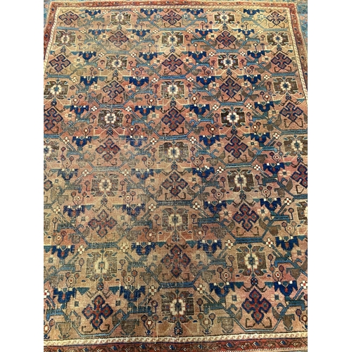 334 - ANTIQUE NORTH WEST PERSIAN RUG. 187cm x 161cm