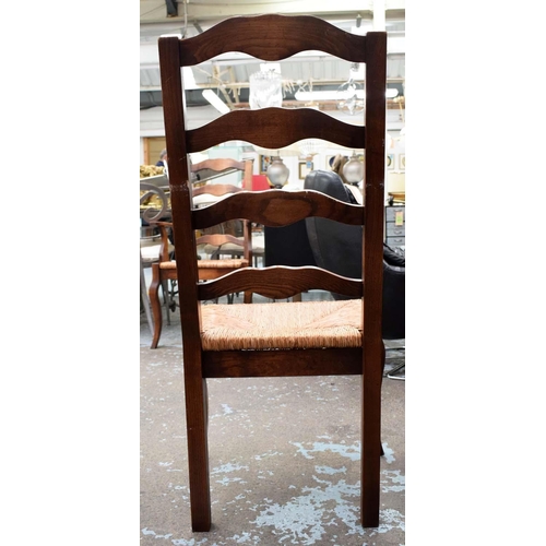 565 - FARMHOUSE DINING CHAIRS, 107cm H, a set of six, ash with rush seats, includes two carvers. (6)