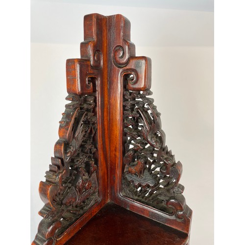 541 - CORNER STAND, Chinese carved hongmu wood, late 19th/early 20th century, intricately carved with anim... 