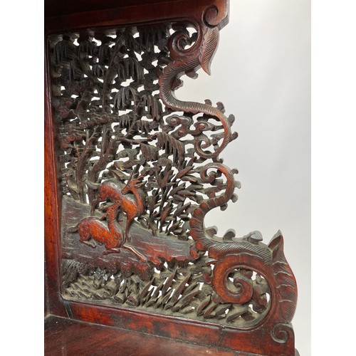 541 - CORNER STAND, Chinese carved hongmu wood, late 19th/early 20th century, intricately carved with anim... 