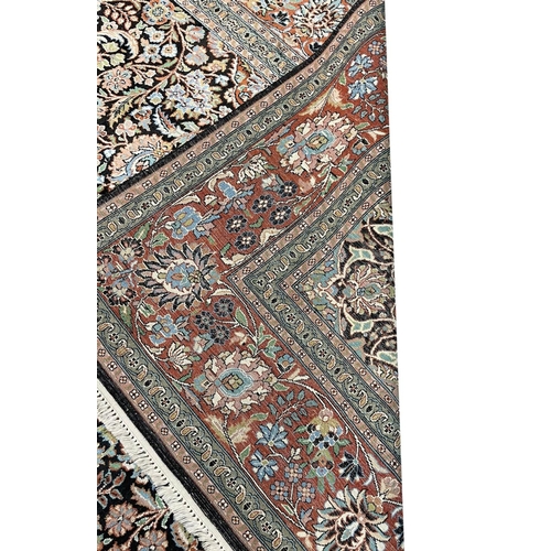 306 - FINE PURE SILK TEHRAN DESIGN CARPET. 300cm x 215cm