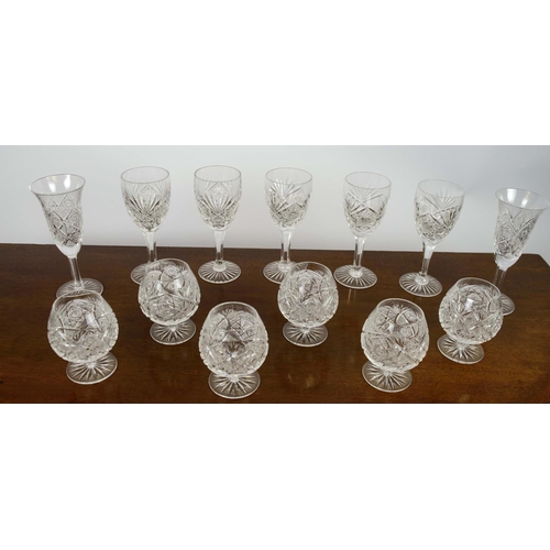 385 - WINE GLASSES, five, along with a set of six brandy glasses and two water glasses, all cut crystal gl... 