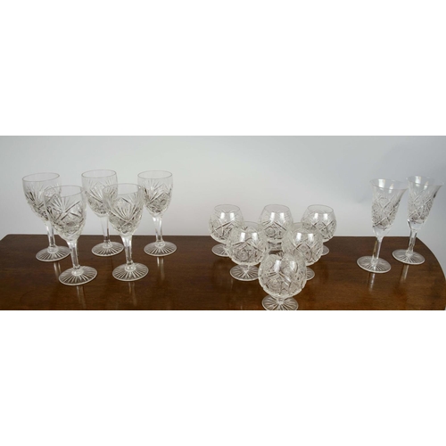 385 - WINE GLASSES, five, along with a set of six brandy glasses and two water glasses, all cut crystal gl... 