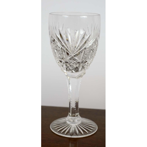 385 - WINE GLASSES, five, along with a set of six brandy glasses and two water glasses, all cut crystal gl... 