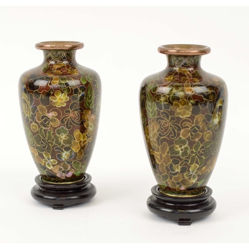 388 - CLOISONNE MINIATURE VASES, a pair, 13cm H, foliate patterned, on wooden stands, and two cloisonné li... 