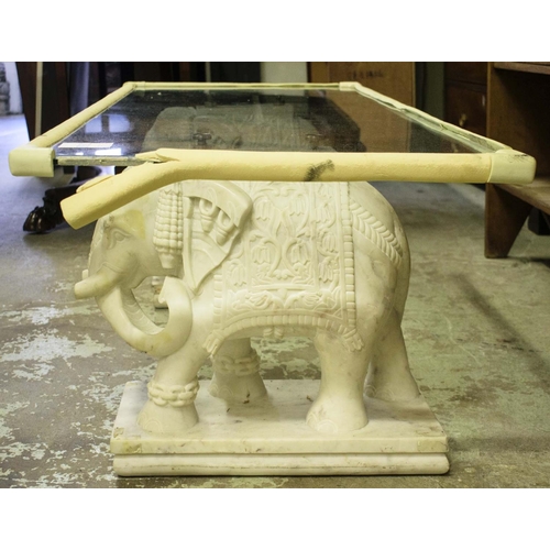 392 - ELEPHANT LOW TABLE, carved marble elephant base pillars, glass top, 150cm x 62cm x 50cm approx.