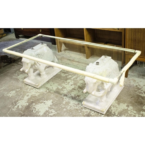 392 - ELEPHANT LOW TABLE, carved marble elephant base pillars, glass top, 150cm x 62cm x 50cm approx.