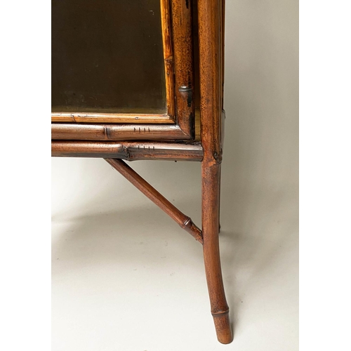 394 - BAMBOO BOOKCASE, 19th century, bamboo framed and Japanese lacquered panelled, with glazed door, 52cm... 