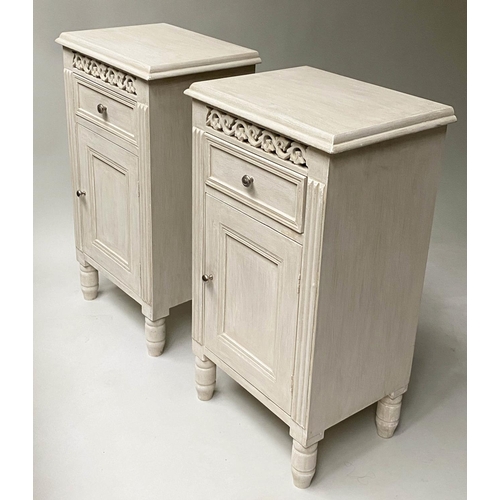 395 - BEDSIDE CHESTS, a pair, French style, traditionally grey painted and pierced, each with drawer and d... 