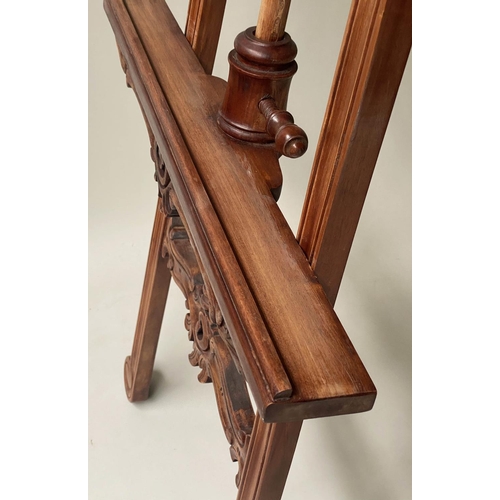 396 - EASEL, French style carved hardwood, with adjustable ledge. 203cm H x 70cm W