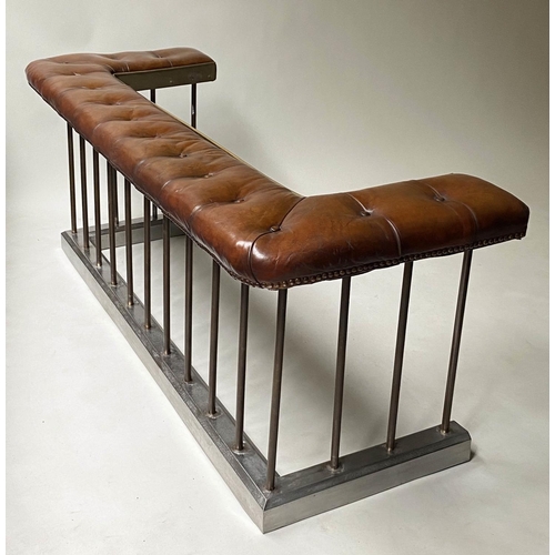 398 - CLUB FENDER, early 20th century, buttoned tan leather, raised upon metal balustrade support, 160cm W... 