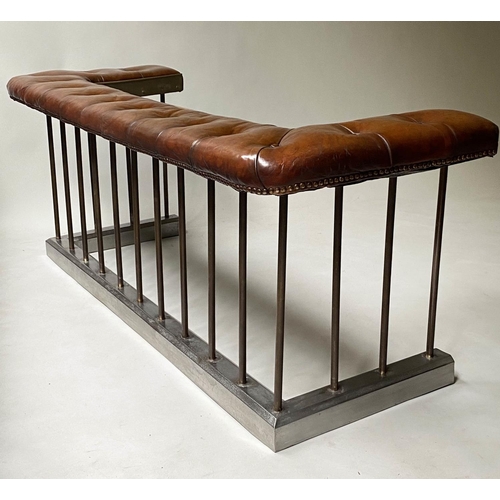 398 - CLUB FENDER, early 20th century, buttoned tan leather, raised upon metal balustrade support, 160cm W... 