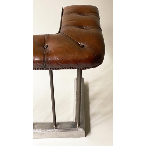 398 - CLUB FENDER, early 20th century, buttoned tan leather, raised upon metal balustrade support, 160cm W... 