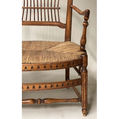 412 - HALL BENCH, late 19th century walnut, with twin arched spindle back and rush seat, probably American... 