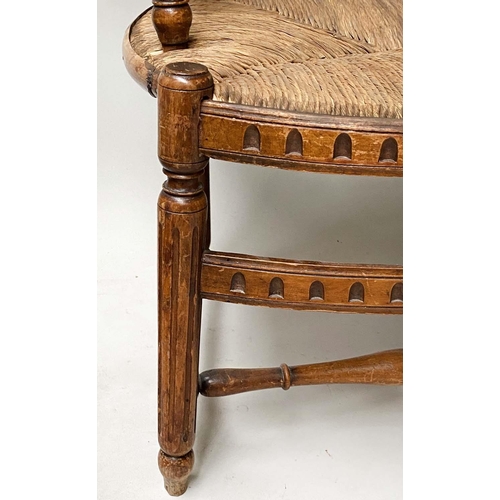 412 - HALL BENCH, late 19th century walnut, with twin arched spindle back and rush seat, probably American... 