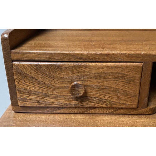 416 - ERCOL WRITING TABLE, 1970's solid elm with gallery and frieze drawer, 69cm x 46cm x 95cm H.