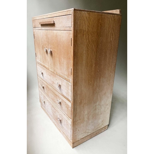 422 - CABINET, mid 20th century, limed oak in the manner of Heals of London, with four drawers and two doo... 