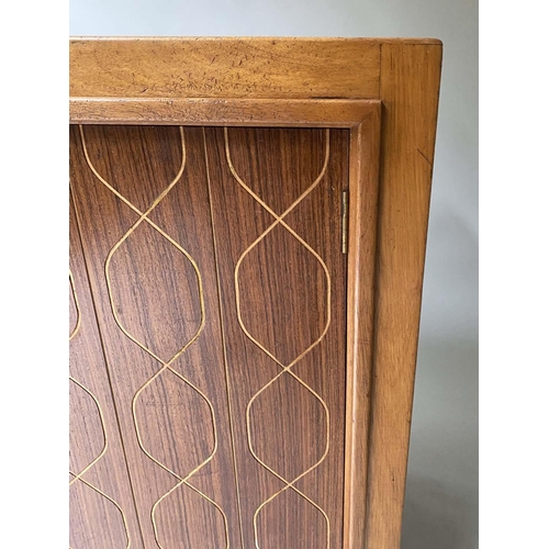 424 - GARDEN RUSSELL DOUBLE HELIX SIDEBOARD, 1960's walnut, with incised decoration and two doors, 122cm W... 