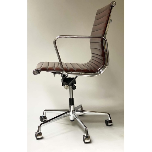 433 - REVOLVING DESK CHAIR, Charles and Ray Eames inspired, ribbed leather, revolving and reclining on an ... 