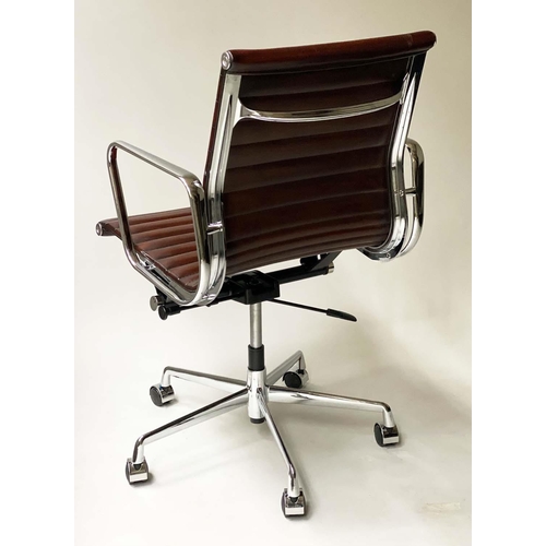 433 - REVOLVING DESK CHAIR, Charles and Ray Eames inspired, ribbed leather, revolving and reclining on an ... 