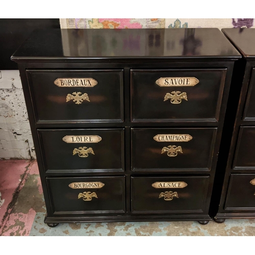 555 - BANKS OF DRAWERS, two ebonised with six drawers each bearing French place names, 38cm W x 92cm L x 1... 