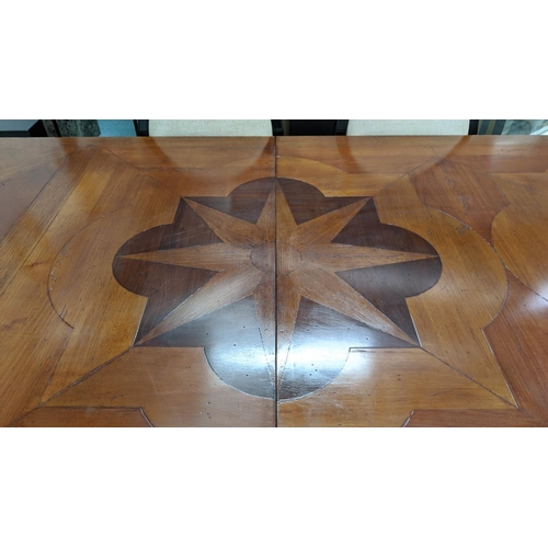 556 - DRAWLEAF TABLE, French provincial style fruitwood, walnut and oak with stellar parquetry top and cen... 