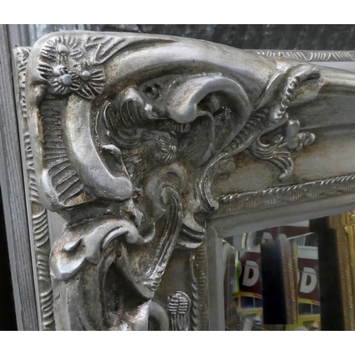 559 - WALL MIRROR, Continental style silvered, 121cm W x 153cm H.