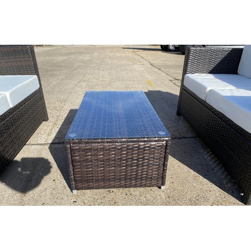 236 - GARDEN SOFAS, a pair, 129cm W with drinks table, faux rattan 89cm x 39cm x 44cm. (3)