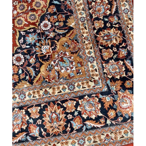 303 - FINE SILK TEHRAN DESIGN CARPET, 240cm x 155cm.