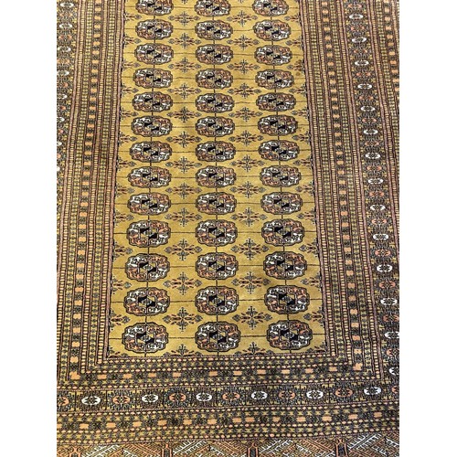 330 - GOLD AFGHAN RUG, 195cm x 130cm.