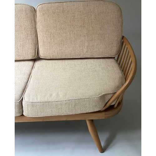 87 - ERCOL 'SURFBOARD' SOFA, 205cm W, elm and beech slatted with seat cushions and surfboard back.