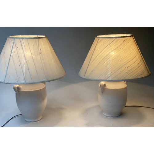 440 - TABLE LAMPS, a pair, Provencal ceramic wine jar form with parchment spun silk shades, 61cm H. (2)