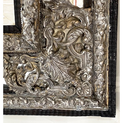 524 - WALL MIRROR, 111cm H x 95cm W, 19th century Dutch, cushion form, repoussé silvered metal, with bevel... 