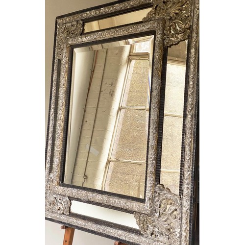 524 - WALL MIRROR, 111cm H x 95cm W, 19th century Dutch, cushion form, repoussé silvered metal, with bevel... 