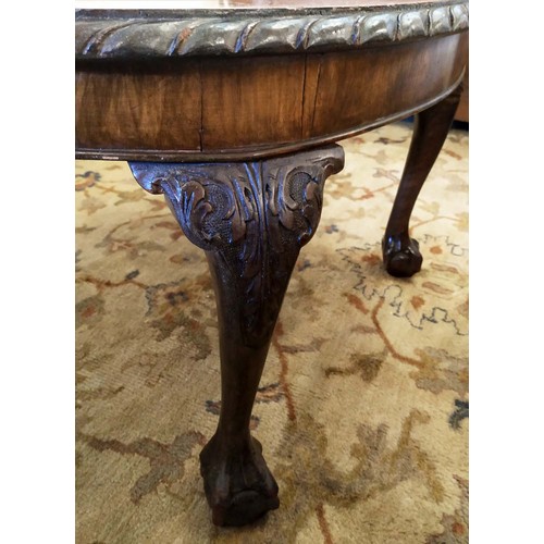 572 - LOW TABLE, George III style, oval top with pie crust border on cabriole legs with ball and claw feet... 